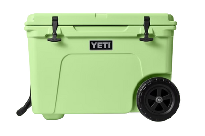 A photo of the Yeti Tundra Haul Wheeled Cooler in colour key lime green, front, closed view.