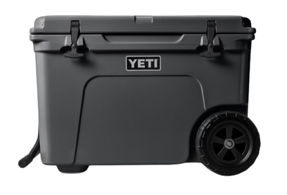 A photo of the Yeti Tundra Haul Wheeled Cooler in colour charcoal, front, closed view.