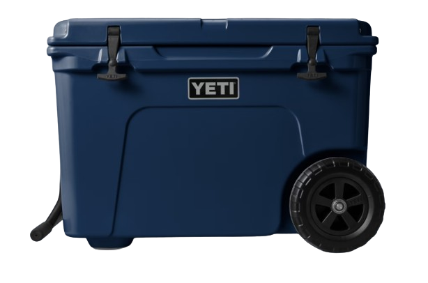 A photo of the Yeti Tundra Haul Wheeled Cooler in colour navy, front, closed view.