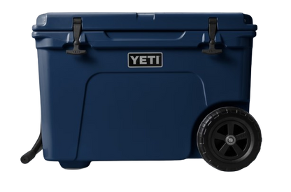 A photo of the Yeti Tundra Haul Wheeled Cooler in colour navy, front, closed view.