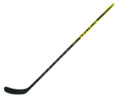 A photo of the True Catalyst 9X Junior Hockey Stick in colour yellow and black. Angled view.