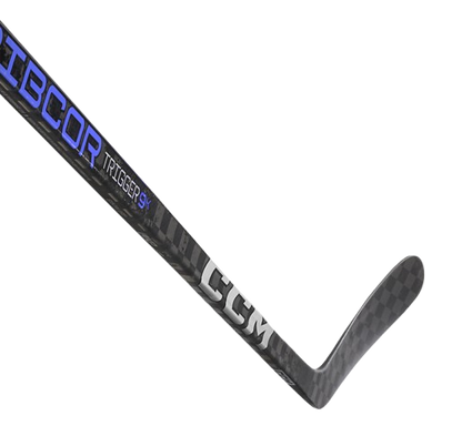 A photo of the CCM Ribcor Trigger 9k Hockey Stick in colour black and purple. Blade view.