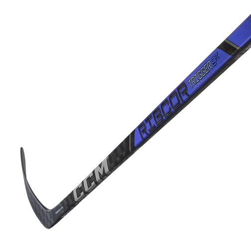 A photo of the CCM Ribcor Trigger 9k Hockey Stick in colour black and purple. Blade view.