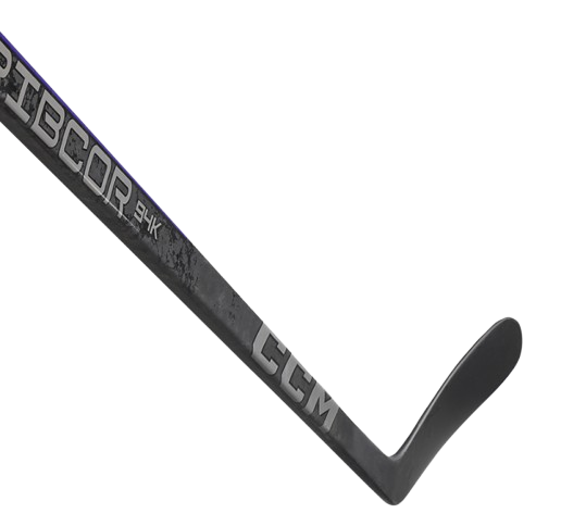 A photo of the CCM Ribcor Trigger 94K Hockey Stick in colour black. Blade view.