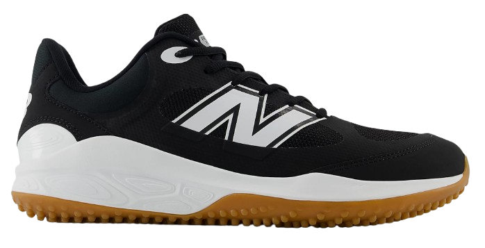 A photo of the New Balance Fresh Foam 3000 V7 Mens Turf-Trainer in colour black and white with tan sole (BK). Side view.