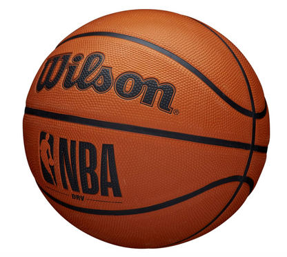 A photo of the Wilson NBA DRV Series Basketball in colour orange. Side view.