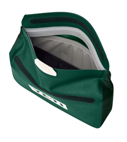 A photo of the YETI SideKick Dry 3L Waterproof Gear Bag in colour black forest green, open bag.