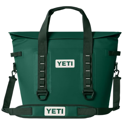 A photo of the Yeti Hopper M30 2.0 Soft Cooler in colour black forest green.