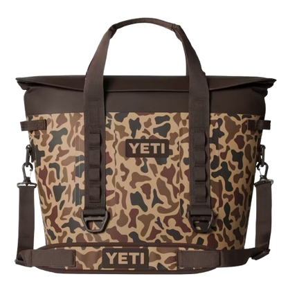 A photo of the Yeti Hopper M30 2.0 Soft Cooler in colour wetlands camo.