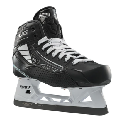 A photo of the True Catalyst 9X4 senior goalie skate in black and white with carbon composite boot, reinforced protection features, NeuRPT+ performance construction, and SHIFT Attack holder with stainless steel blade for high-level goaltending.