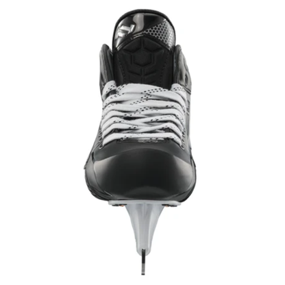 A photo of the True Catalyst 9X4 senior goalie skate in black and white with carbon composite boot, reinforced protection features, NeuRPT+ performance construction, and SHIFT Attack holder with stainless steel blade for high-level goaltending.