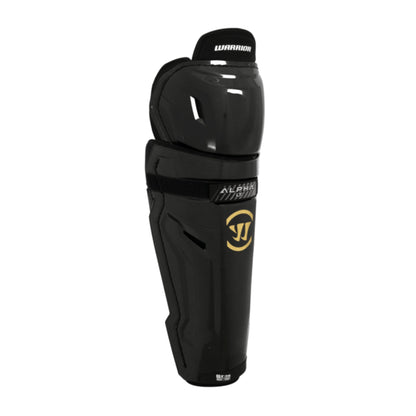 A photo of the Warrior Alpha LT Hockey Shin Guards (2026) in colour black with gold Warrior logo.