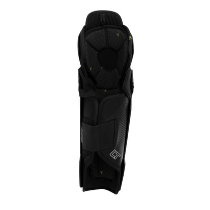 A photo of the Warrior Alpha LT Hockey Shin Guards (2026) in colour black with gold Warrior logo.