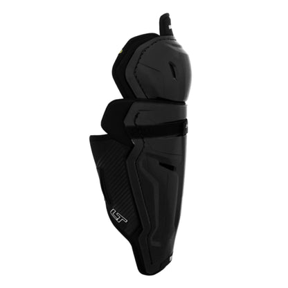 A photo of the Warrior Alpha LT Hockey Shin Guards (2026) in colour black with gold Warrior logo.