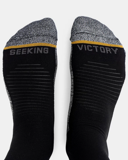 A photo of the Warroad Game Day Tech Hockey Socks in colour black.