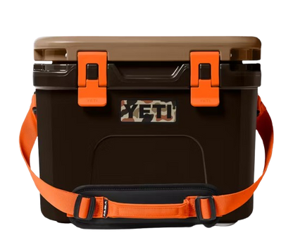 A photo of the Yeti Roadie 15 Hard Cooler in colour brown and orange.