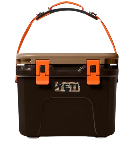 A photo of the Yeti Roadie 15 Hard Cooler in colour brown and orange.