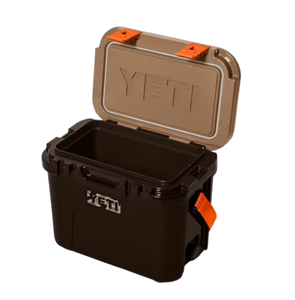 A photo of the Yeti Roadie 15 Hard Cooler in colour brown and orange.