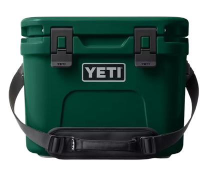 A photo of the Yeti Roadie 15 Hard Cooler in colour dark green.